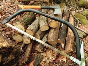 Author-cut-many-different-lengths-of-wood-with-Fiskars-Bow-Saw-for-splitting-into-smaller-pieces-to-use-in-wood-burning-stove