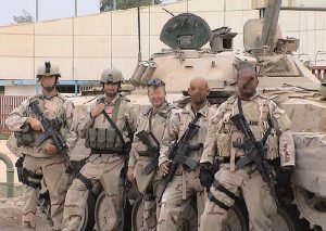 Baghdad,-2003-author-(second-from-left)-with-M4A1-and-SOPMOD-Block-I-items-first-issued-in-1997
