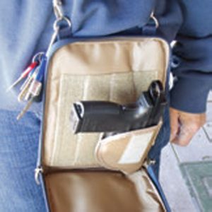 Four-inch-XD-with-Slide-Pull-easily-fits-in-popular-Gun-Tote’n-Mamas-concealed-carry-purse