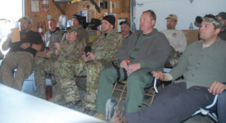 How we learn. Students sit through lecture on Combat Casualty Care at EAG Shoot House class. This period may also include video or Power Point media.