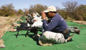Sniper-and-spotter-partner-drills-at-300--to-800-yard-range-line