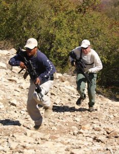 Students-run-up-hill-for-team-shoot-competition