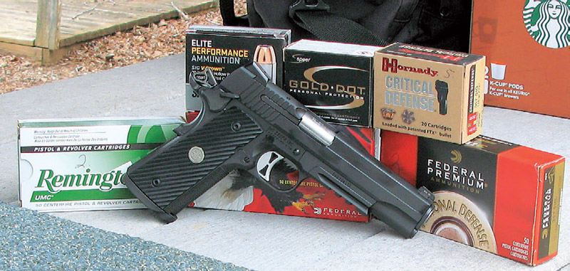 TACOPS-1911-with-some-of-ammunition-used-in-evaluations