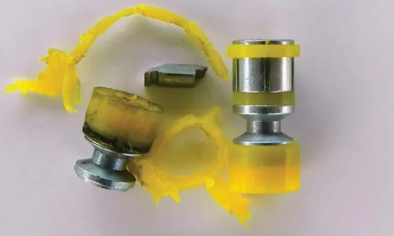 Unfired-Hexolit-slug-with-shard-recovered-from-ballistic-testing