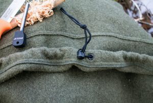 Waistband-is-drawn-shut-with-elastic-band-and-paracord-lock