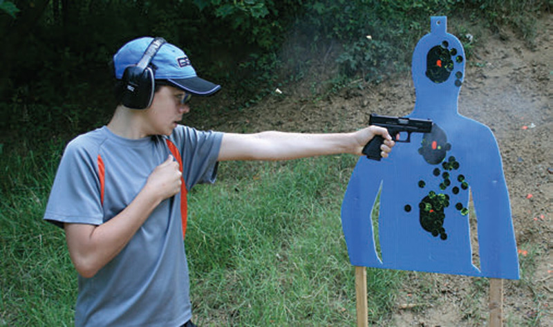 Young-shooter-fires-multiple-rounds-combat-style-one-handed