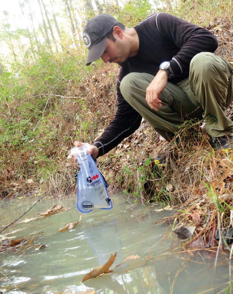 Author-dunks-Geigerrig-2L-Hydration-Bladder-in-a-small-stagnant-creek-in-Louisiana-backwoods