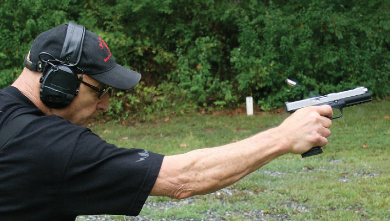 Author-fires-9mm-Strike-One-one-handed-to-judge-recoil-control