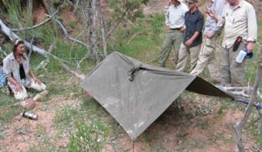 B.O.S.S.-instructor-Lori-Jonestrask-demonstrates-shelter-building-using-a-poncho