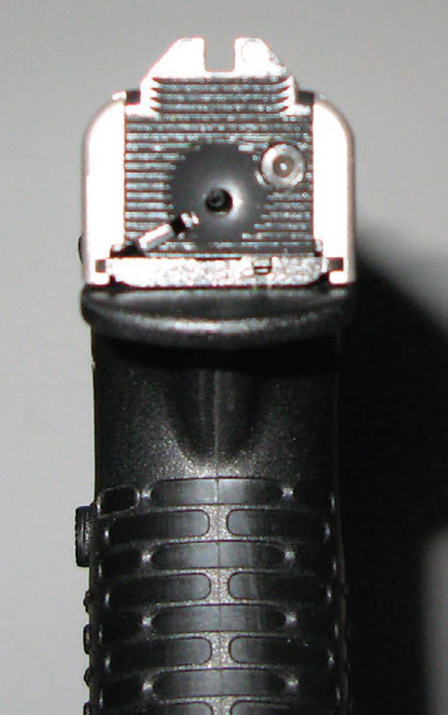 Back-plate-with-rear-sight-aperture-indicates-striker-is-cocked