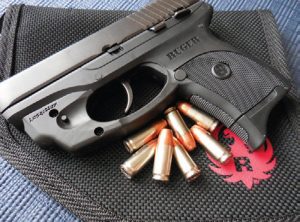 Compact-9mm-handgun-such-as-Ruger-LC9-with-integrated-laser-makes-for-easy-concealment-and-quick-target-acquisition