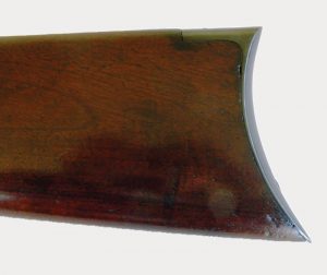 Crescent-buttplate-of-Winchester-1895-rifle-fits-into-the-shoulder-well