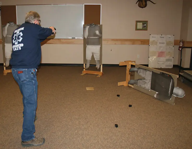 Deputy-engages-two-bad-guys,-one-standing-and-one-on-the-ground