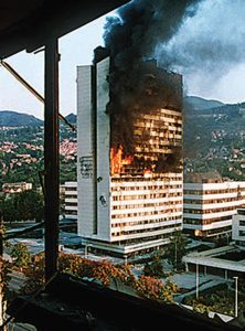 Early-on,-government-building-in-Sarajevo-burns-from-tank-rounds