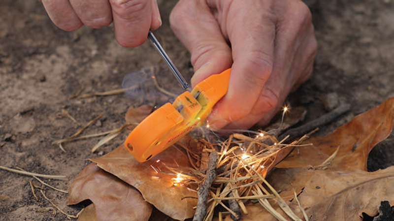 Ferrocerium-fire-rod-is-used-in-carbide-V-notch-for-maximum-amount-of-sparks-you-can-get