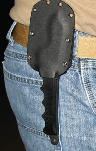 Fixed-blade-version-of-HETK-is-designed-to-be-worn-upside-down-behind-pistol