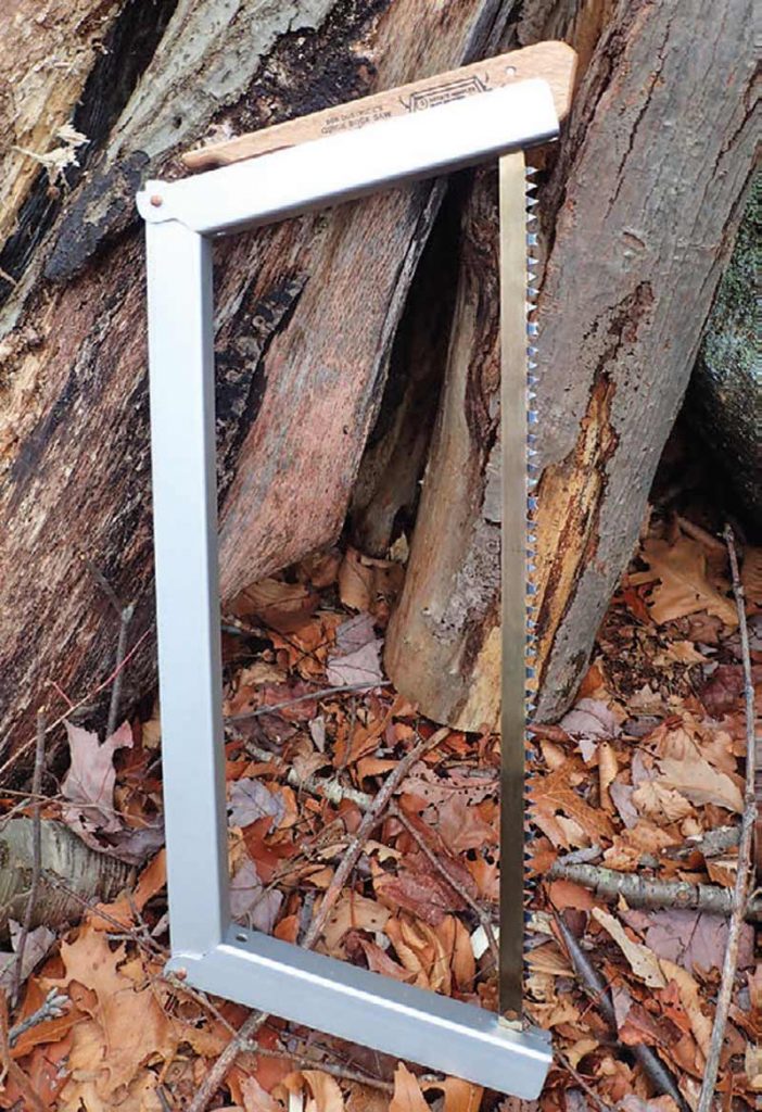 Heavy-duty folding buck saws designed and handcrafted by Bob Dustrude in northern Minnesota. The 21-inch saw weighs only 15 ounces.