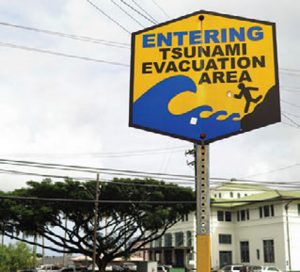 In-the-South-Pacific,-evacuation-signs-are-often-posted-for-emergencies