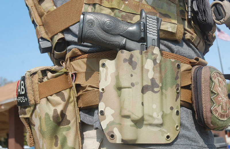 Kyle-Harth-of-Tactical-Night-Vision-Company-carries-his-M&P-pistol-with-SureFire-X300-Ultra-in-an-American-Renegade-Carry-Systems-high-ride-holster