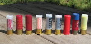 Left-to-right--Brenneke-slug,-00-buckshot,-#6-birdshot,-bean-bag,-rubber-slug,-rubber-buckshot,-shell-cracker,-tear-gas,-and-breaching-round