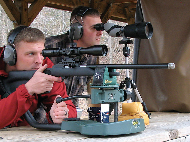 Members-of-USMC-rifle-team-shoot-Magnum-Lite-rifle-for-groups-at-50-yards