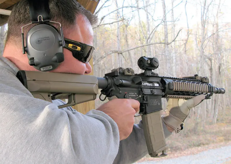 Mike-Nix-fires-customized-12.5-inch-barreled-Class-III-carbine-chambered-for-.300-Blackout.