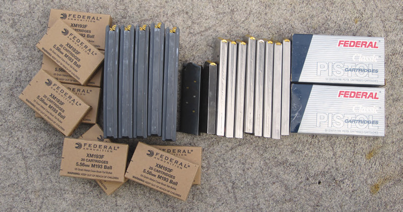 One-hundred-rounds-of-.45-ACP-ammo,-eight-10-round-and-three-seven-round-magazines