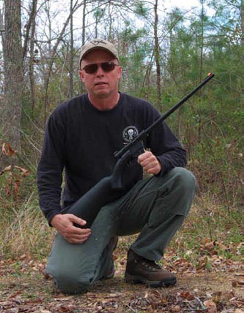 Randall-with-the-Henry-AR-7-Survival-Rifle-he-used-for-the-tests-and-currently-packs-into-the-woods-on-his-frequent-outings