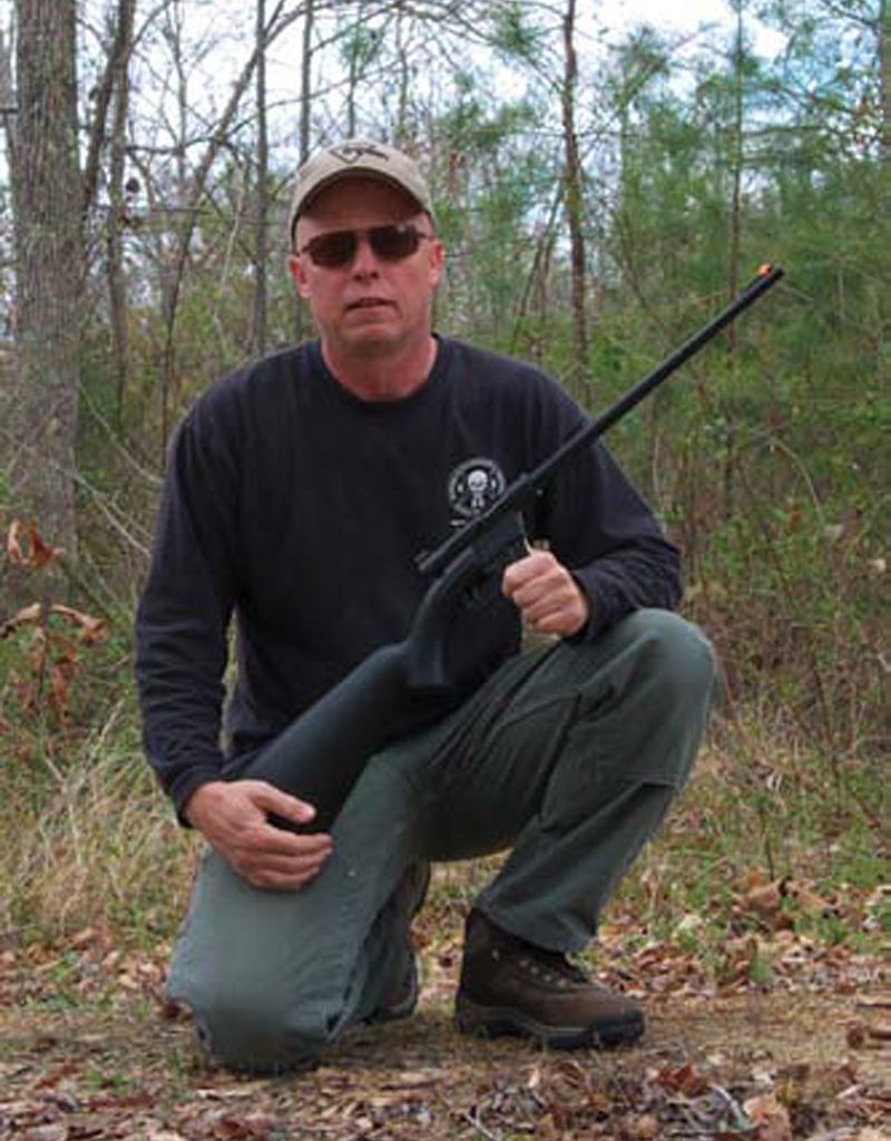 Randall-with-the-Henry-AR-7-Survival-Rifle-he-used-for-the-tests-and-currently-packs-into-the-woods-on-his-frequent-outings