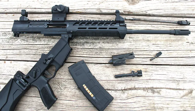 SIG556xi-functions-via-long-stroke-adjustable-gas-piston-with-a-rotating-bolt-carrier-group-similar-to-the-AK’s