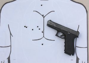 Silhouette-shows-results-of-testing-Glock-17-with-front-sight-touching-inner-left-edge-of-rear-notch-out-to-25-yards