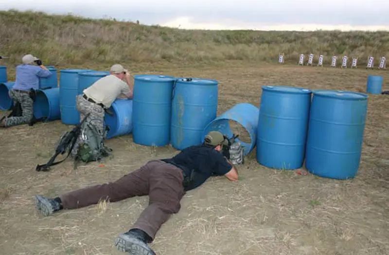 Some-contestants-search-for-their-number-on-25-yard-targets,-while-others-shoot-theirs