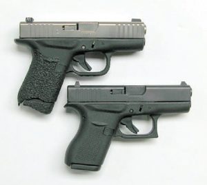 Stock-Glock-42-and-modified-ROBAR-G42-(top)