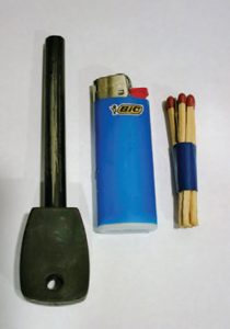 Three-ways-of-making-a-fire-ferrocerium-rod,-lighter,-and-matches