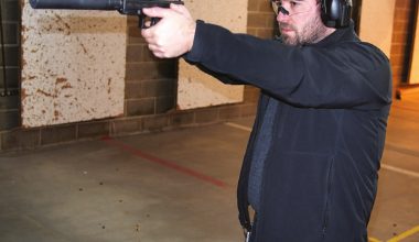 Author-shooting-his-Glock-19-equipped-with-an-Advanced-Armament-TiRant-9-suppressor