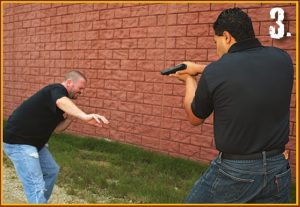 Author-steps-back-to-draw-his-weapon-as-attacker-tries-to-recover-from-elbow-strike