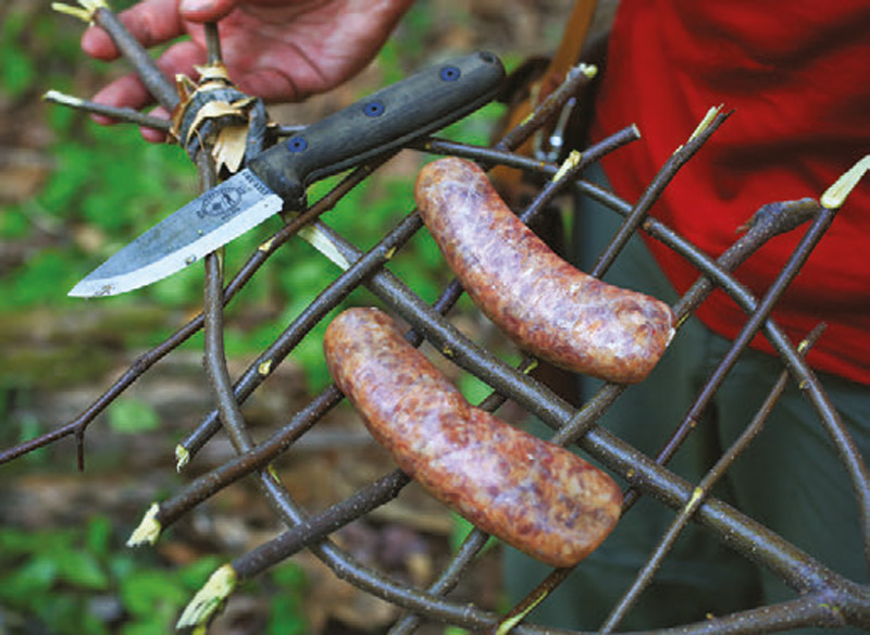 Author-uses-hand-grill-for-cooking-over-coals,-not-an-open-flame