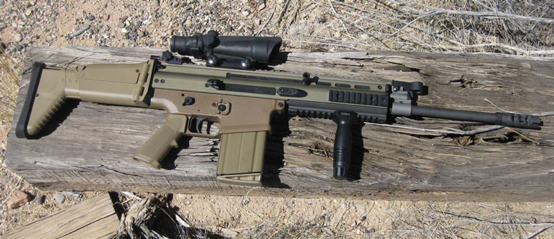 Dark-Earth-FN-SCAR-Heavy-MK17S-blends-well-with-railroad-tie-in-the-Arizona-desert