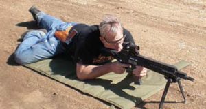 Denny-Hansen-prepares-to-fire-SSAR-15-equipped-carbine