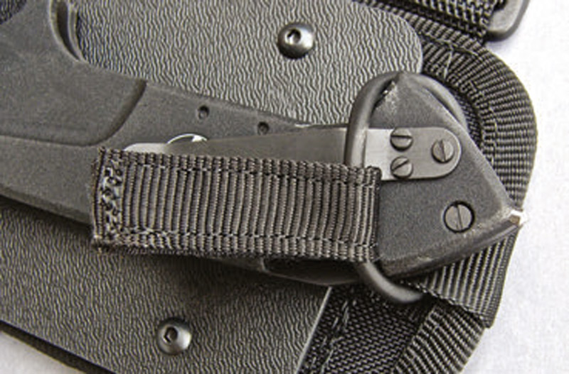 In-addition-to-friction-retention-in-sheath,-there-is-a-secondary-retention-ring-with-quick-grip-tab