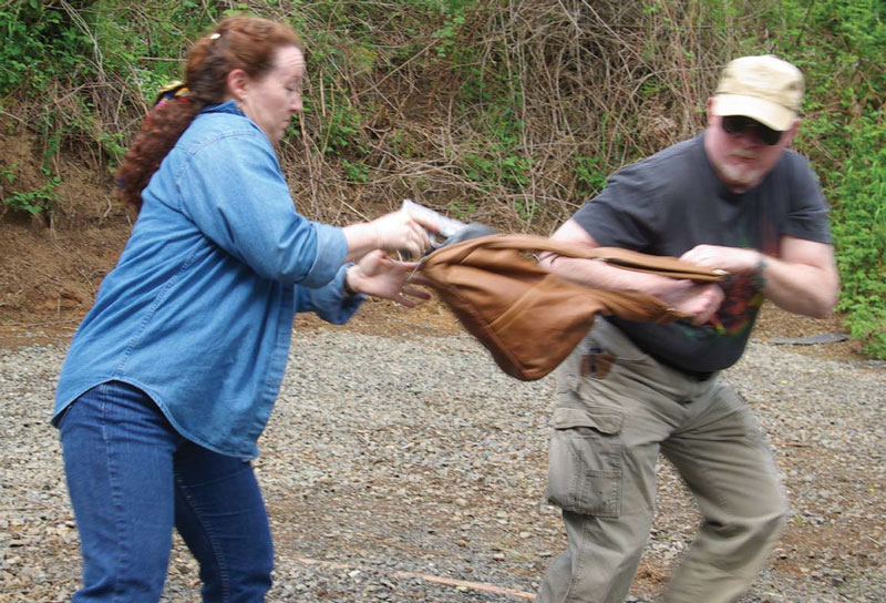 In-the-event-of-a-purse-grab,-hold-on-tight-to-the-important-handgun--