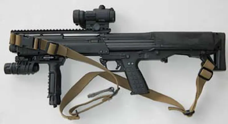Kel-Tec-KSG-set-up-for-duty-with-Aimpoint-PRO-red-dot-sight