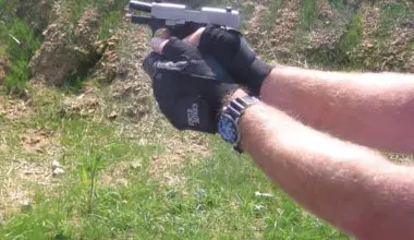 P238-in-full-recoil-with-slide-locking-back-after-firing-last-round.-Note-angled-barrel-compared-to-slide-orientation