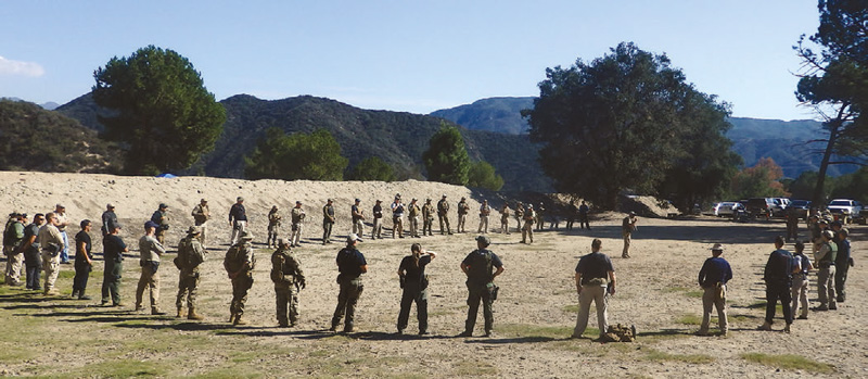 Participants-lined-up-on-flat-range-for-initial-instruction-and-to-count-off-into-groups--