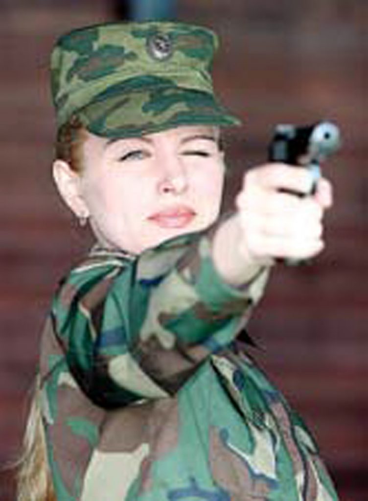 Russian-woman-shoots-her-Makarov-in-classic-one-hand,-one-eye-technique
