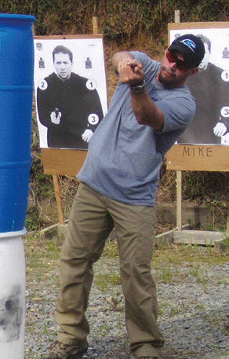 Seeklander-demonstrates-roll-out-technique-for-shooting-around-cover