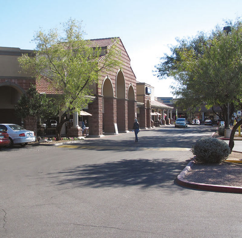 Site-of-Tucson-shooting,-a-suburban-shopping-center,-bears-a-discreet-memorial