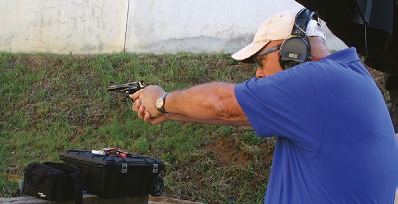 Wayne-Dobbs-demonstrates-his-firing-stance-with-a-revolver