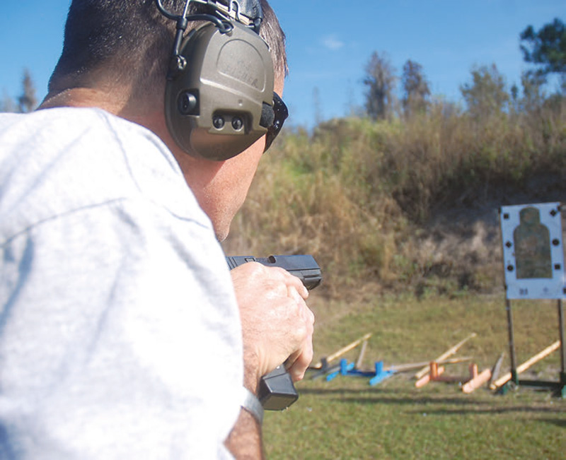 and-immediately-snaps-his-pistol-back-to-a-close-retention-position