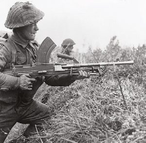 Although-Bren-is-a-heavy,-ungainly-weapon,-British-Bren-Gunners-trained-to-fire-it-from-the-assault-position